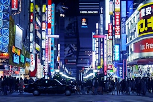 crowd surrounded by trees during daytime