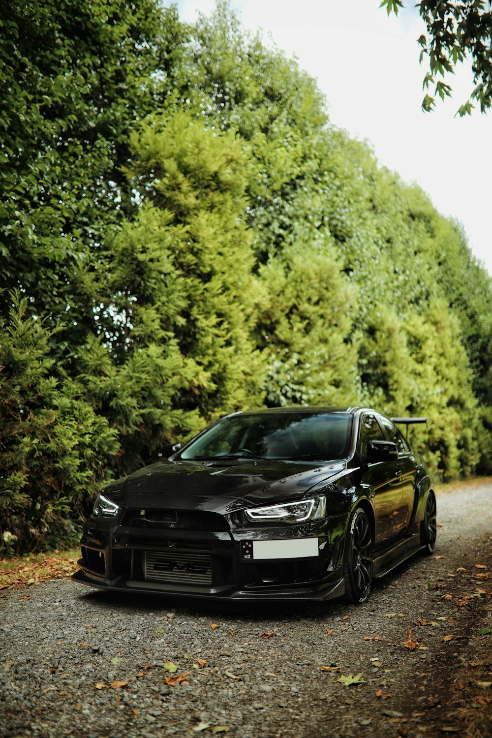 parked black coupe