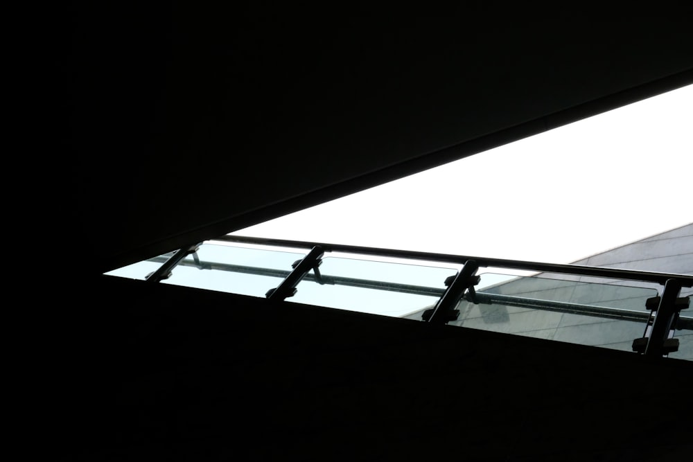 a person standing on a stair case in a building