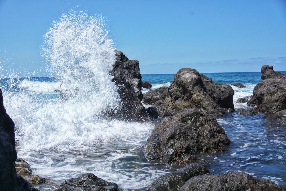 water splashes gray rocks