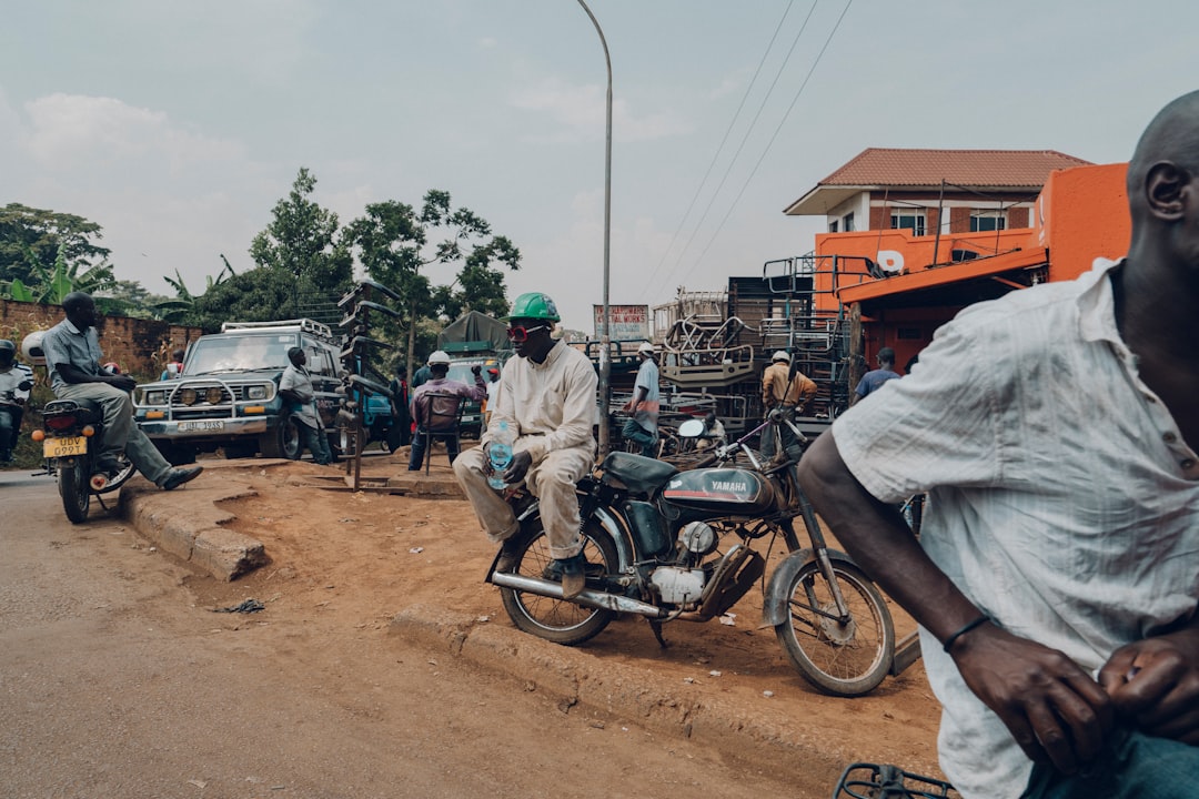 man sitting on motorcycle