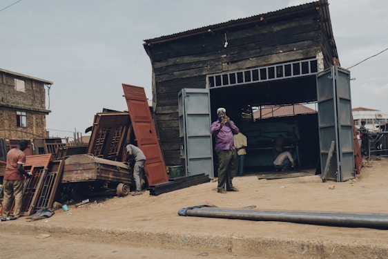 Photo of Tuff Manufacturers' workshop showing skilled workers assembling architectural hardware.
