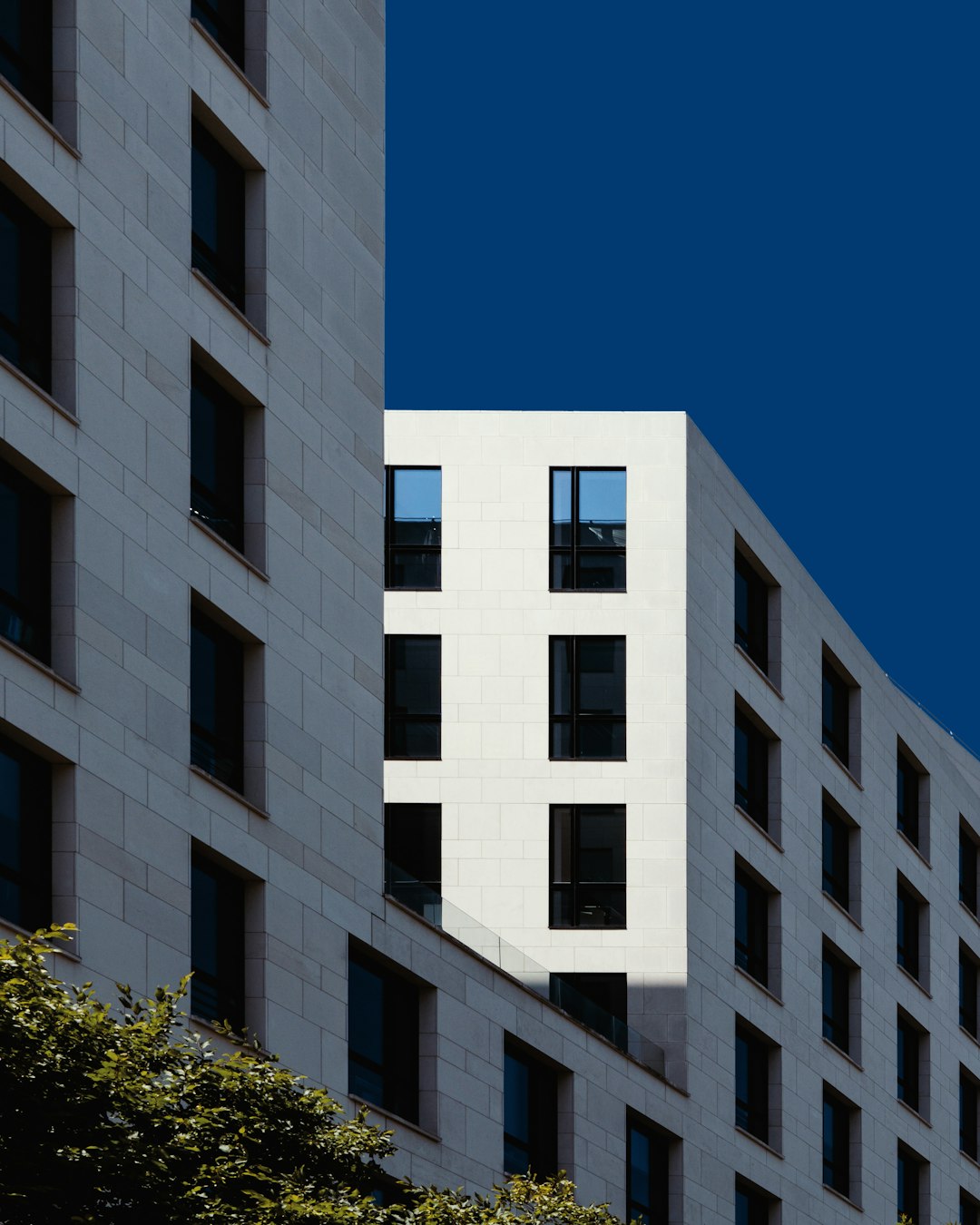 white building under blue sky