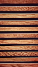 a close up of a wooden slatted surface