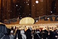 A winter market stall with an igloo providing a warm, inviting space for customers.