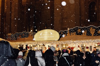 A winter market stall with an igloo providing a warm, inviting space for customers.