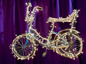 A vibrant display of colorful bike lights arranged on a wooden table