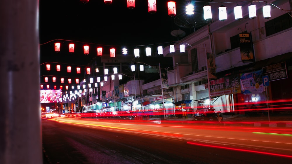 time lapse photography of red lights