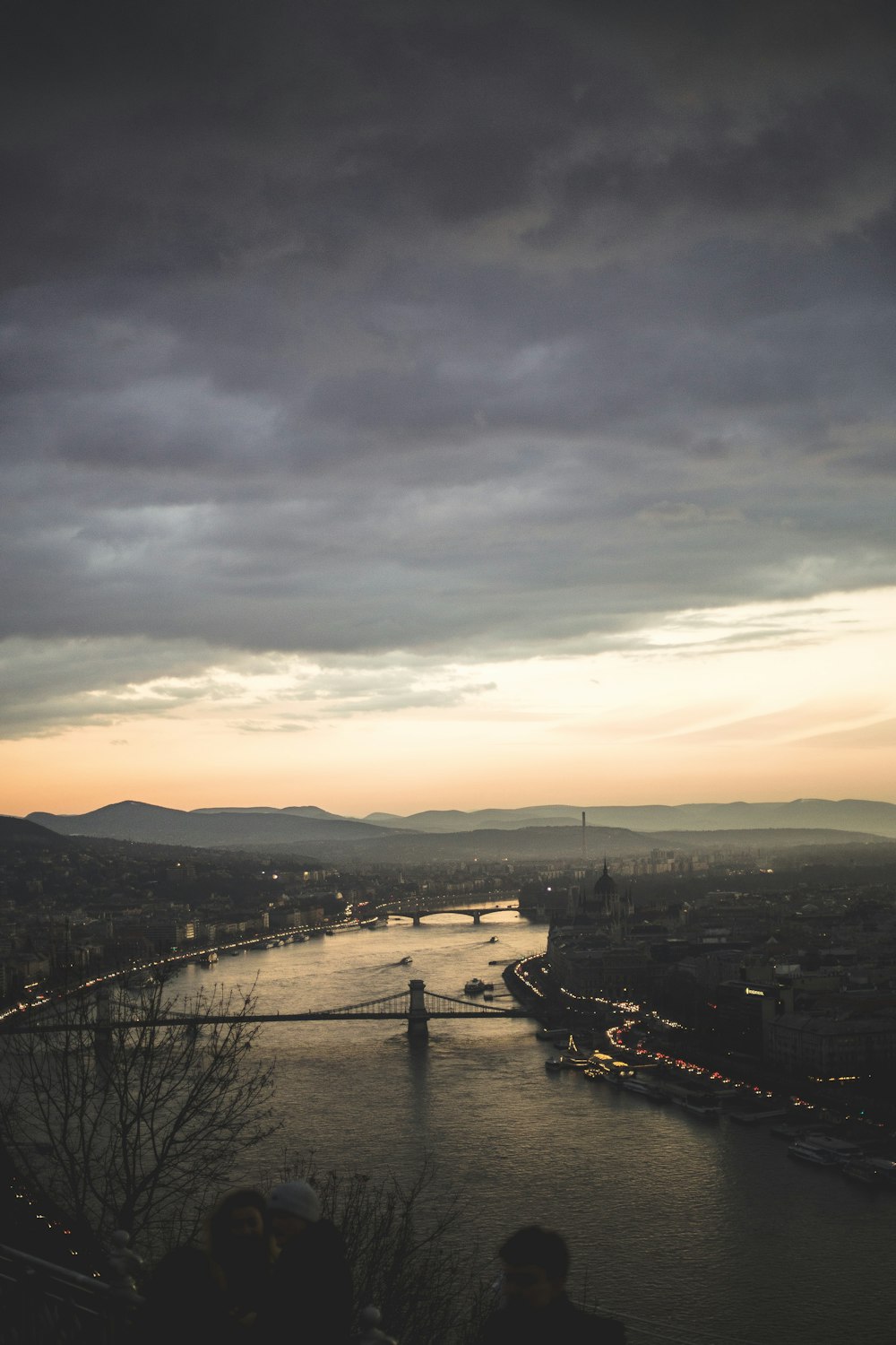 aerial photography of body of water under cloudy sky