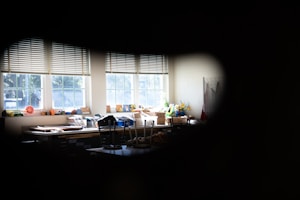 Brightly lit aisles filled with paints, brushes, and other DIY supplies.