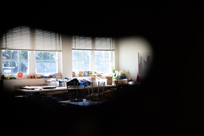 A warm, inviting space with art supplies and musical instruments.