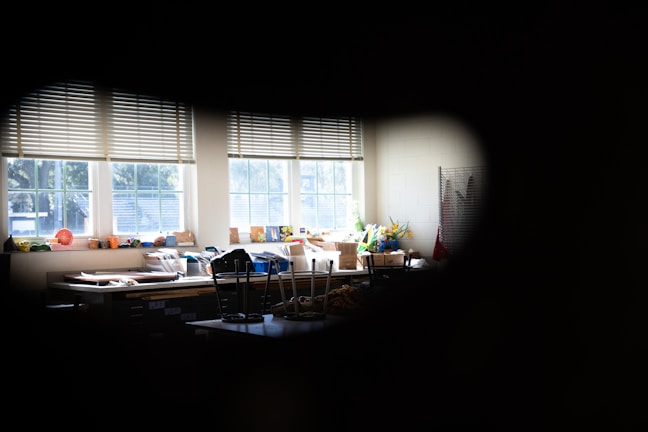 A cozy workshop space filled with natural light and art supplies.