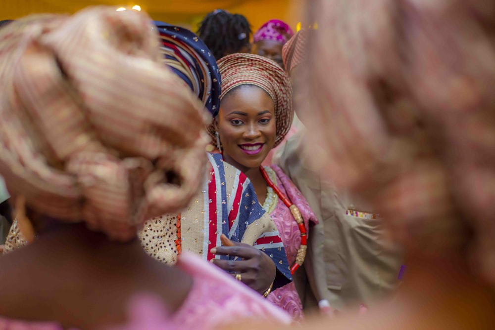 profile of woman wearing multicolored dress