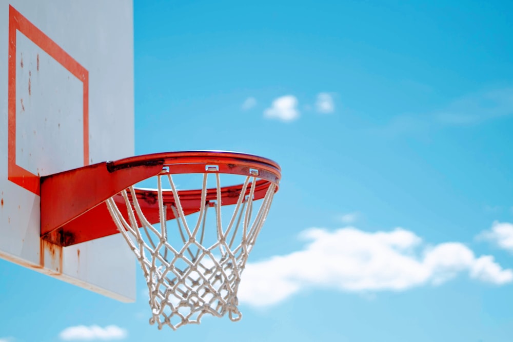 red basketball hoop with white net