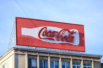 architectural photography of Coca-Cola tarpaulin