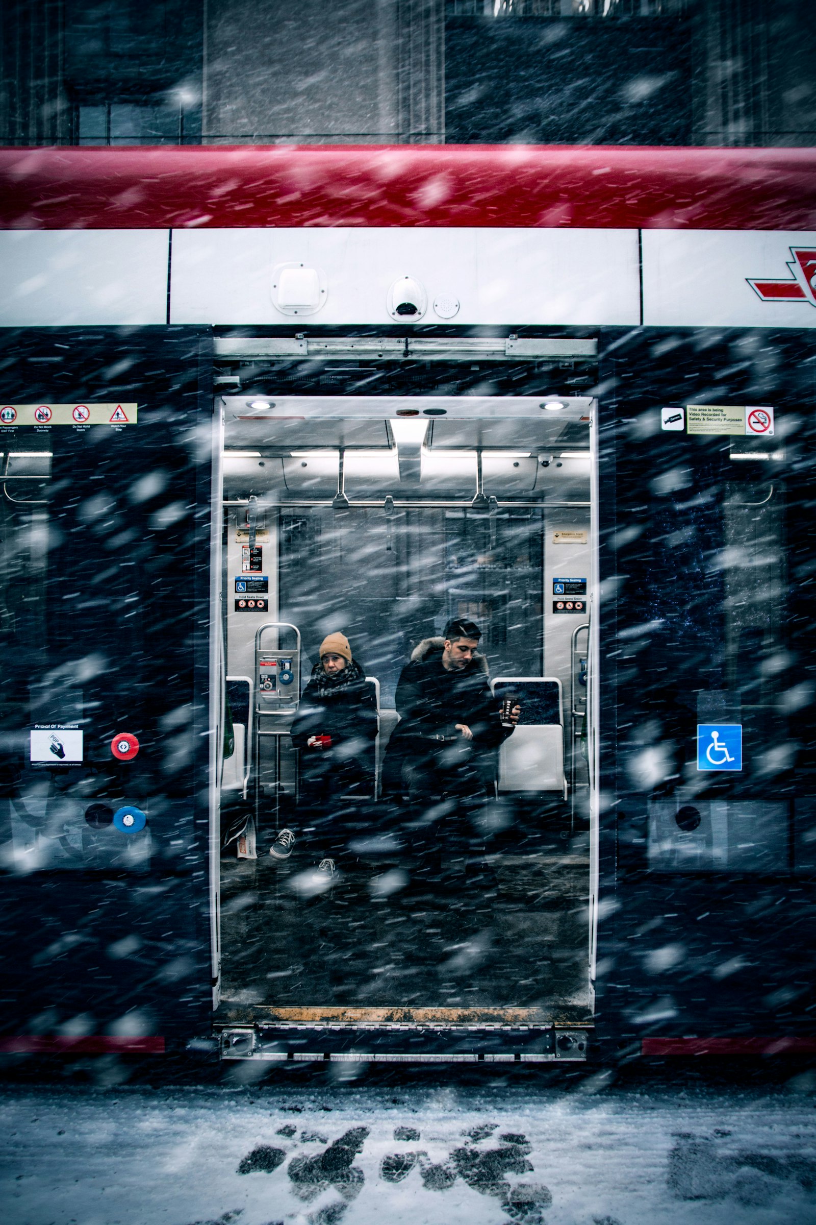 Canon EOS 70D + Sigma 17-70mm F2.8-4 DC Macro OS HSM | C sample photo. Two persons inside train photography