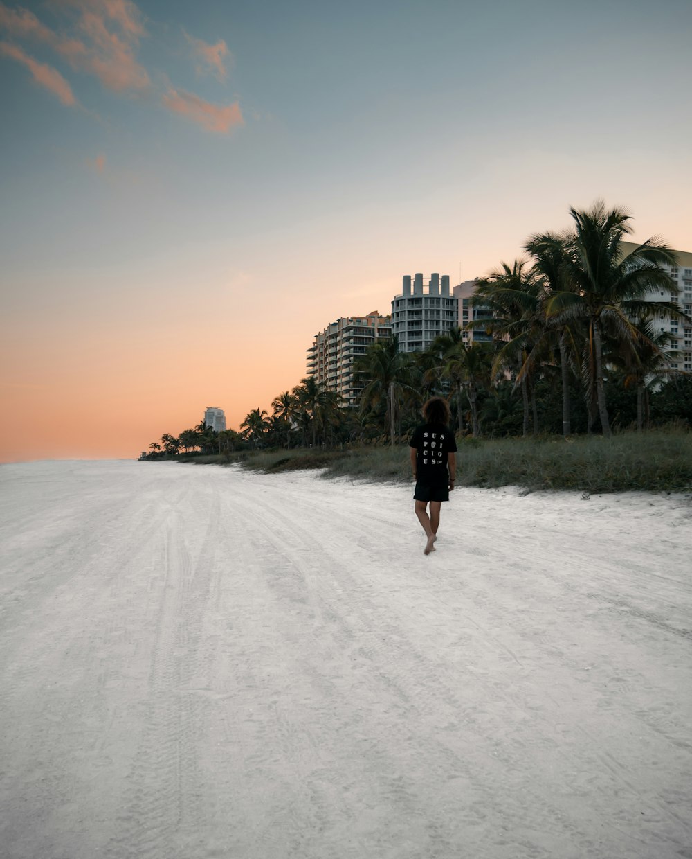 person walking on road