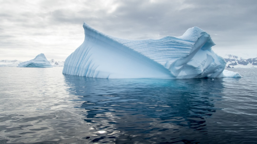 glacier surrounded water,