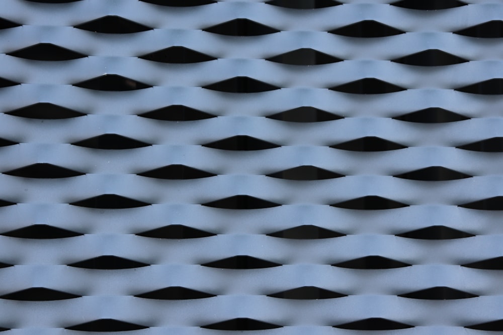 a close up of a cell phone with a pattern on it