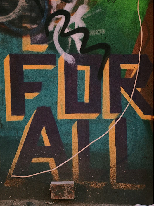 A graffiti wall, representing storytelling told in your own voice, not a corporate script