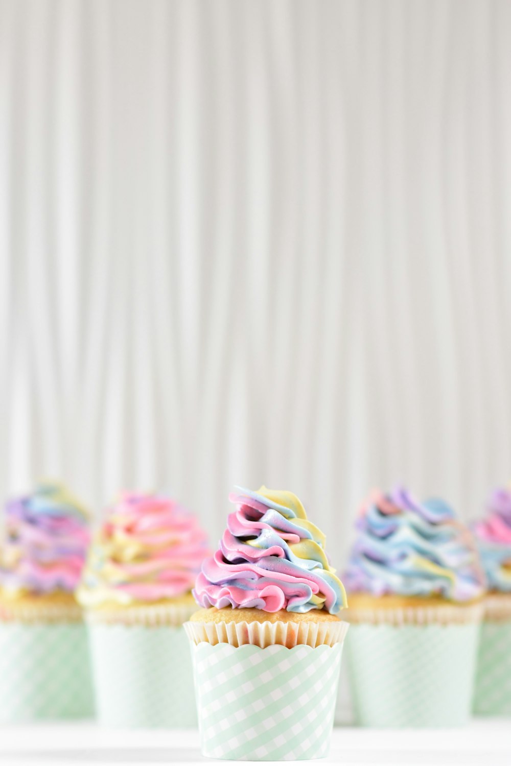 glassa su due cupcakes