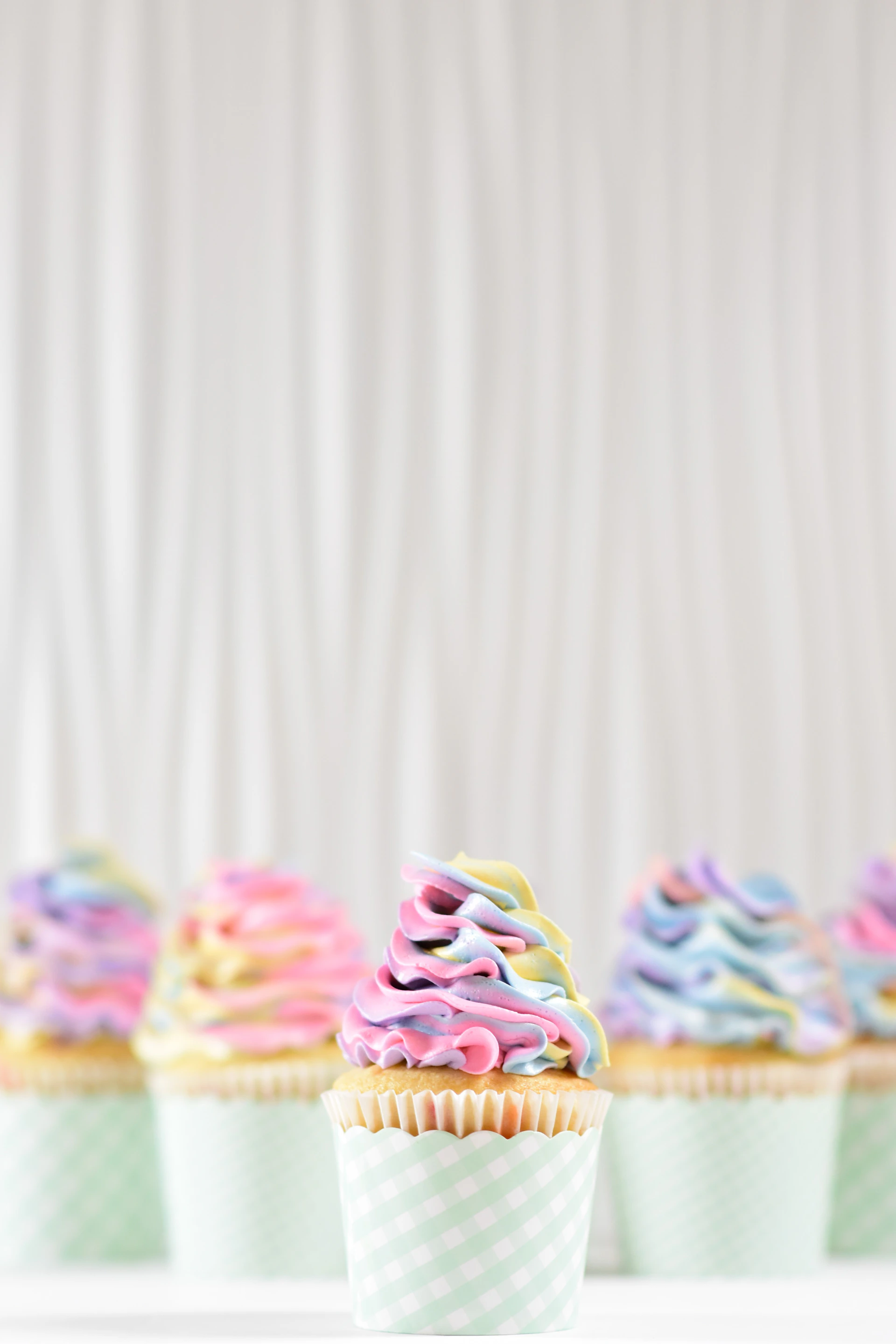 frosting on two cupcakes