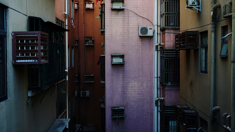 concrete buildings with window-type AC units