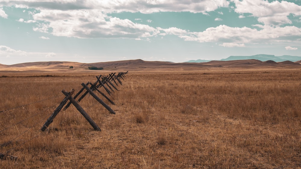 fence at the field during day