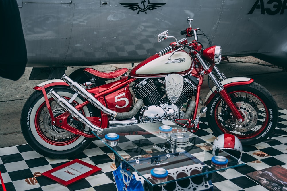 red and white cruiser motorcycle