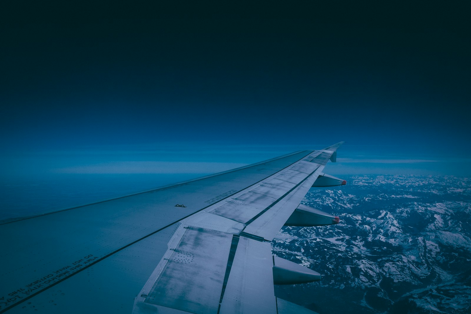 Fujifilm XF 8-16mm F2.8 R LM WR sample photo. Gray airplane wing photography