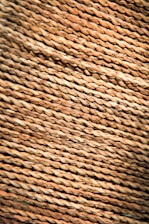 Close-up image of cotton and blended yarns produced by Vinatex Twisters, highlighting texture and color.