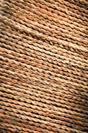 Close-up image of cotton and blended yarns produced by Vinatex Twisters, highlighting texture and color.