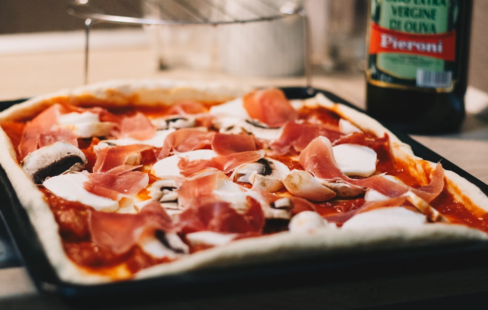 pizza on black tray