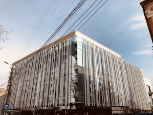 A modern commercial building with visible electrical installations.