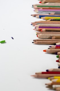 color pencils on white surface