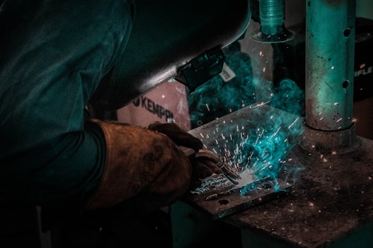 person welding machine