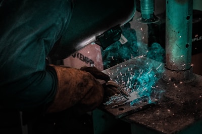person welding machine
