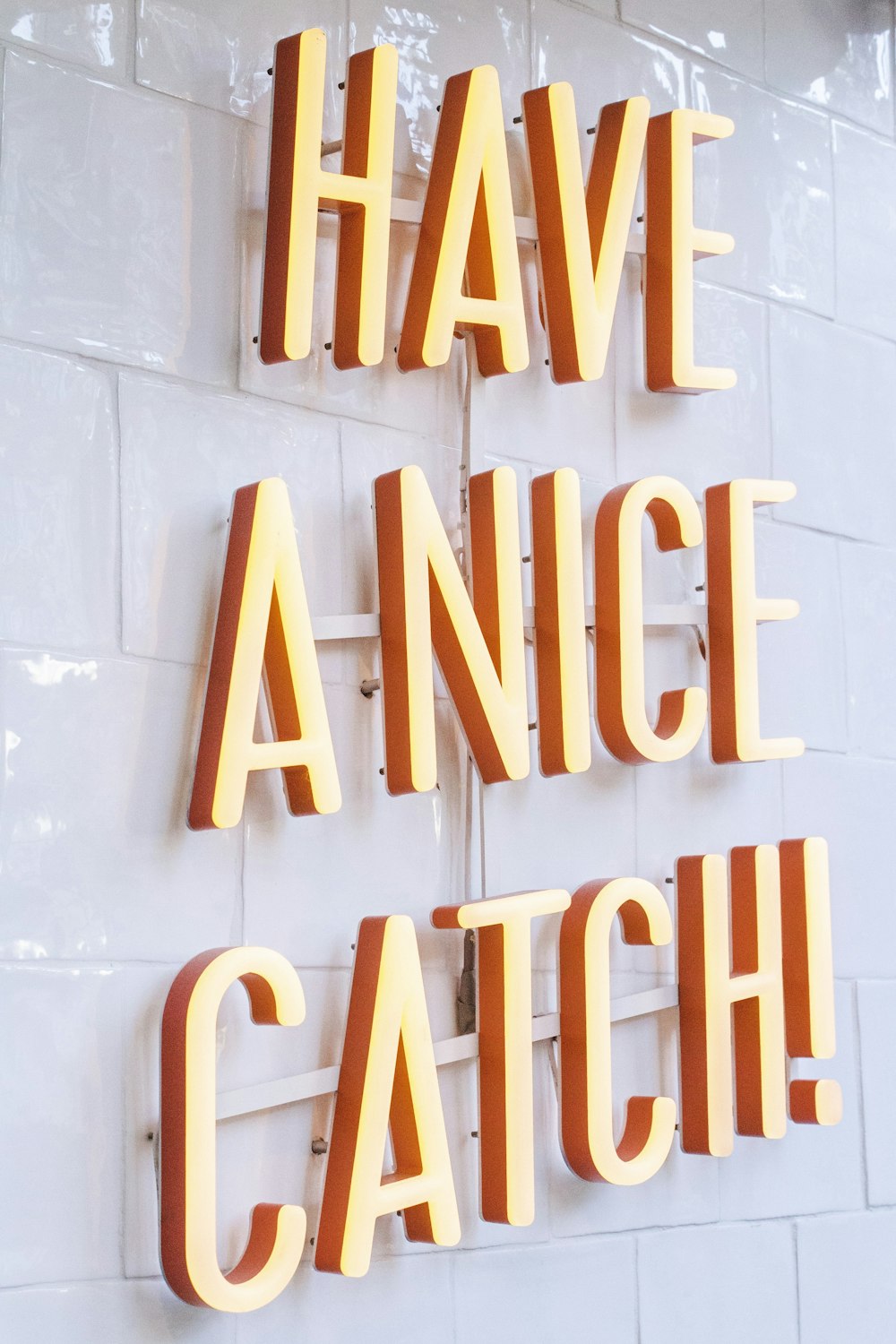 orange Have a Nice Catch! neon signage