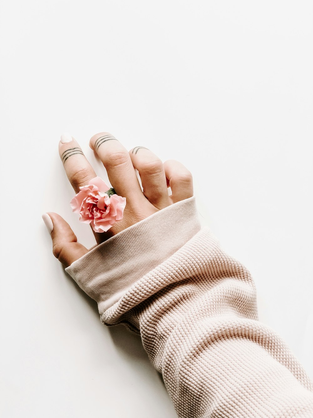 woman wearing rose ring