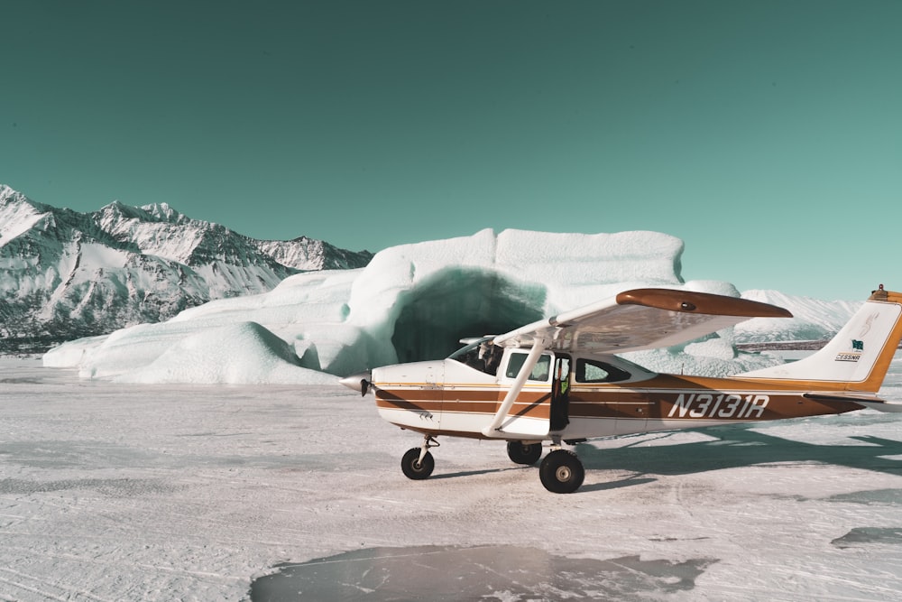 monoplane on snowy peak