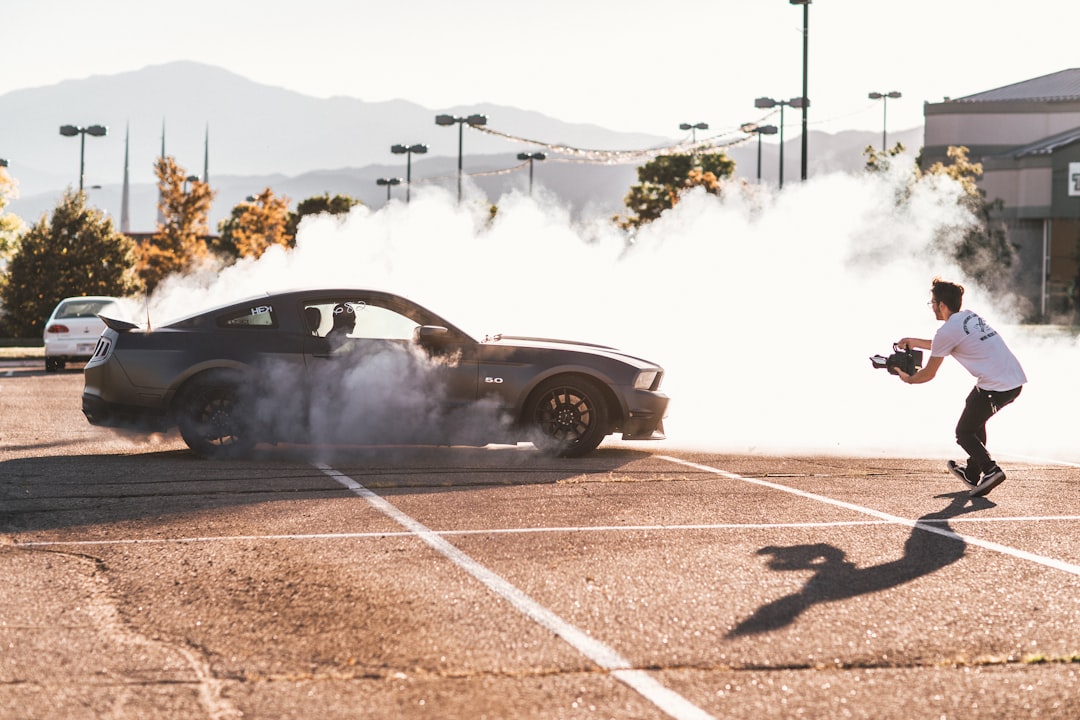 Car being filmed wheel spin and smoke – content marketing - Photo by Zachary Varga | best digital marketing - London, Bristol and Bath marketing agency