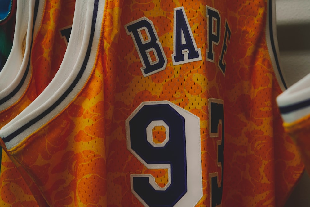 orange and white Bape 93 jersey