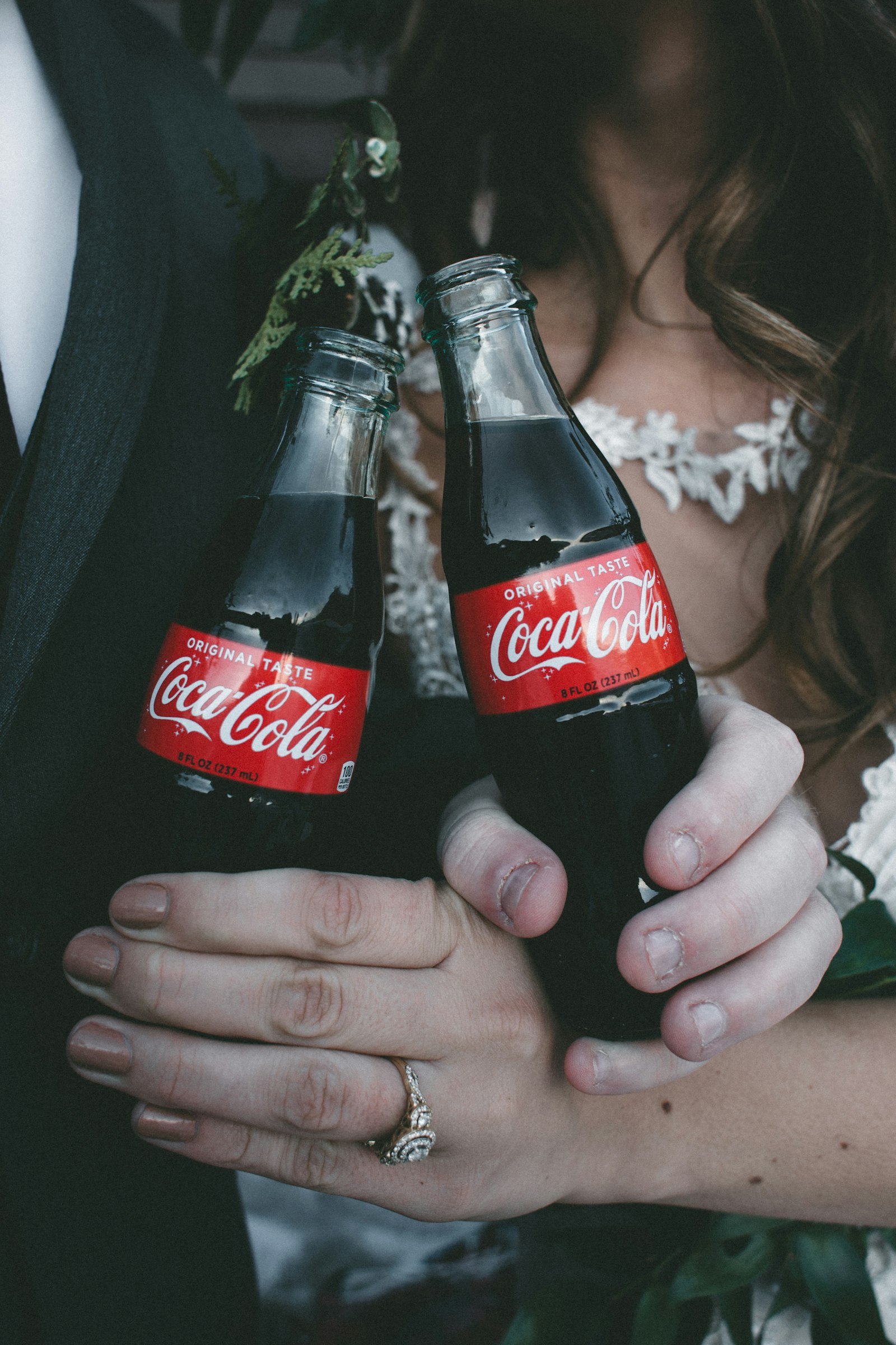 Canon EF 28mm F1.8 USM sample photo. Two coca-cola soda bottles photography