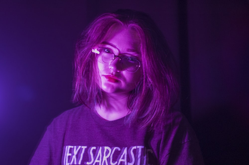 woman wearing eyeglasses and black shirt