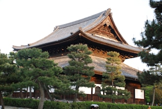 A beautifully crafted traditional residence with warm wooden accents and classic architectural details.