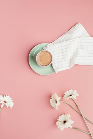 white ceramic mug with coffee