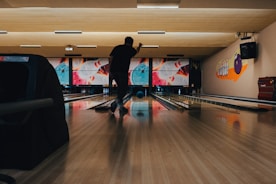 man playing bowling