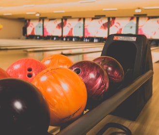 bowling balls on rack