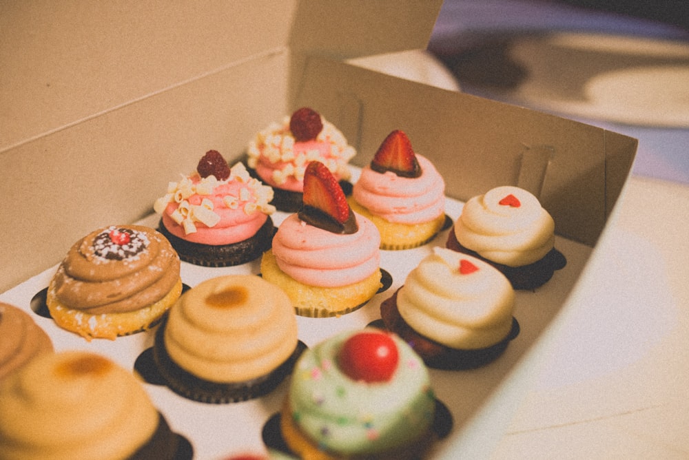 shallow focus photo of cupcakes