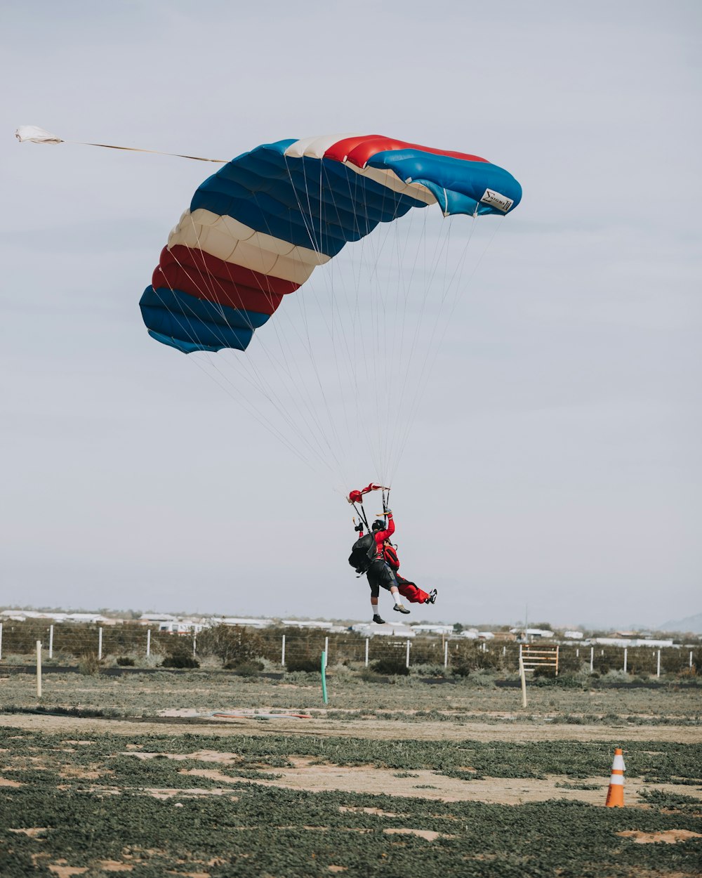 person riding parachute